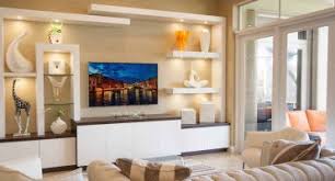 Clutter can build up quickly in a space that's used by the whole household living rooms are multifunctional spaces, so they need lighting for all the different tasks they need to perform. 2019 Living Room Trends For Custom Entertainment Centers