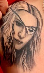 Topeka woman breaks tattoo world record