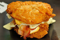 Arrange chicken on a rack over a baking pan; Double Down Sandwich Wikipedia