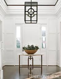 Traditional Foyer With Round Table Bradshaw Orrell Entryways Foyer Entry Foyer Design Foyer Decorating Traditional House