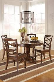 Mango solids, upholstered seating and an acacia veneer are among the many highlights of the porter collection. Porter Dining Chair Ashley Furniture Homestore Side Chair Dining Room Wooden Dining Chairs Brown Dining Room