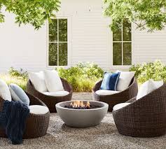 This is a beautiful rattan papasan chair with a base made from a combination of rattan and polyester. Torrey All Weather Wicker Papasan Swivel Chair Espresso Pottery Barn