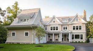 Stairs by the garage lead up to a media room that could easily serve. 60 L Shape House Garage Ideas House House Exterior House Styles