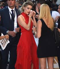 Amber heard on the red carpet. Amber Heard Receives Emergency Touch Up On The Red Carpet At Magic Mike Premiere Mirror Online