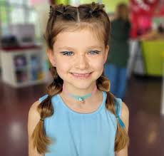 BIRTHDAY GIRL 8 is great! Our beautiful girl is celebrating her special day  with the milestone of getting her ears pierced. She's a force, and dads  have their hands full 🥰. From