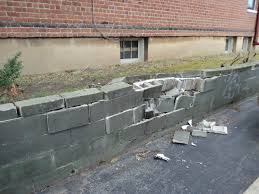 How do you repair a block wall? Cement Block Wall Removal Service Wichita Hauling Junk Moving