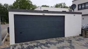 Doppelgarage Grossraumgarage Aus Stahl Mit Sektionaltor Anbau Garage Als Gerateraum Doppelgarage Sektionaltor Anbau