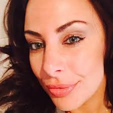 Glamour model wanted by police is 'too scared' to hand herself in because  of stalker