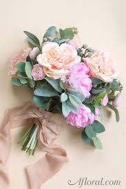 This article has pictures, advice and several videos to show you how it's done, using fresh or silk flowers. Diy Bride Make Your Own Wedding Bouquet With Premium Artificial Flowers From Afloral Com Diy Wedding Bouquet Artificial Flowers Wedding Wedding Bouquets