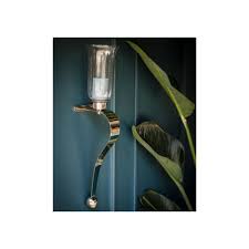 Wall sconces that work as candle holders have the benefits of being less inexpensive in that you aren't using power and purchasing batteries. Culinary Concepts Small Pair Of Curved Candle Wall Sconces Candles Lanterns From Cp Lighting Interiors Uk