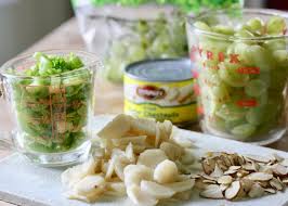Cover the raisins with hot water and soak for at least 10 minutes (the warm water will help the raisins plump up); Crunchy Chicken Salad Sock Box 10
