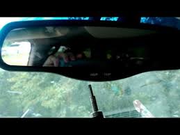 Rear view mirror will then twist counter clockwise off of the aluminum button on the windshield. How To Remove The Rear View Mirror Gmc Yukon Denali Chevy Silverado Avalanche Youtube