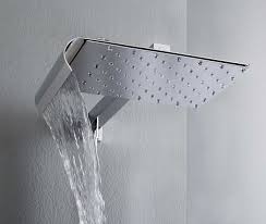 And, of course, the waterfall showerhead is one of our favorites. Bathrooms Design Ideas Inspiration Photos Trendir Shower Heads Modern Shower Modern Shower Head