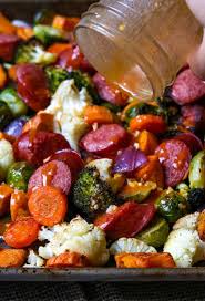 Healthy Sheet Pan Sausage And Veggies With Smoked Paprika Vinaigrette Recipe Caramelized Veggies Smoked Sausage Recipes Beef Sausage Recipes