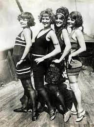 Combining the right look with the. 1920s Swimsuits Women And Men Parasols Too