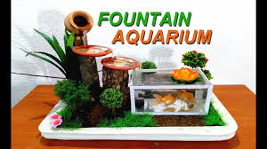 You may want to add your decor when you are doing your next water change so the water level in the tank is lower. Make Aquarium In A Mini Garden Diy Youtube