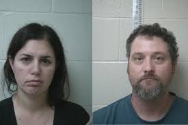 Dunn County road superintendent, local photographer arrested