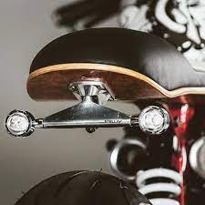 Themotoblogs Themotoblog Skateboard Deck Seat Pan And Trucks On This Triumph Built By Roguemotorcycle Bmw Cafe Racer Cafe Racer Parts Cafe Racer Build