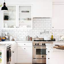 The wall cabinets will give you extra storage space while their white color will make your kitchen brighter even in minimum light. 15 Modern White Kitchens