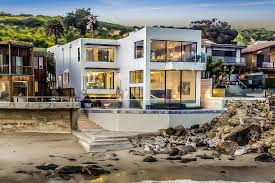 Malibú) is a beach city in western los angeles county, california, situated about 30 miles (48 km) west of downtown los angeles. Barry Manilow S Malibu Beach House Top Ten Real Estate Deals