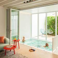 Experience loads of fun with these house swimming pool at alibaba.com that are leakproof and trendy in design. Small Indoor Pool Nested In A Tiny Minimalist Belgium House Small Indoor Pool House Design Home
