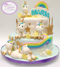 Fondant Unicorns Cake Accompanied With Rainbows Clouds And Stars For An 11th Birthday Unicorn Birthday Cake Baby First Birthday Cake First Birthday Cakes