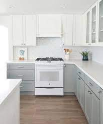 Here we see blue lower and white upper cabinets and a custom hood by randall. 25 Edgy Two Tone Kitchen Designs You Ll Love Shelterness
