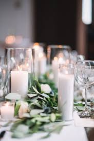 Wedding flower terminology, budget, tips and inspiration to help you make those pesky floral decisions. Event Decor Decor Ideas Candles Greenery Rehearsal Dinner Decor Rehear Rehearsal Dinner Decorations Rehearsal Dinner Centerpieces Dinner Centerpieces