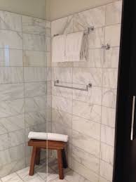 I'm searching for bathroom towel rack ideas that won't break the bank, and that usually means it's time to diy. Towel Racks Inside The Shower Shower Towel Rack Ideas Towel Rack Shower Towel