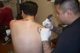 Flyrite tattoo celebrates 20th anniversary. Lightsaber Tattoos Steven Huie At Flyrite Tattoo In Willia Flickr