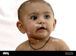 Cute south asian indian baby hi-res stock photography and images