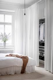 Headboard / wall treatment behind bed. Seven Interesting Ways To Use Curtains These Four Walls