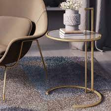 The eileen gray side table, designed in 1927, was one of her most rational designs, reflecting her desire for pure, functional perfection. Eileen Grey Side Table Brass