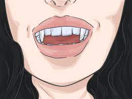 Your best bet is to get some poly grip that is used for dentures.the putty doesn't stick well and it doesn't cost a lot,i really can't think of anything that you can use at home.hope this helps you out,happy haunting! How To Apply Vampire Fangs Without Glue 11 Steps With Pictures