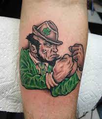 Black ink celtic cross tattoo on left half sleeve. Top 87 Best Irish Tattoo Ideas 2021 Inspiration Guide