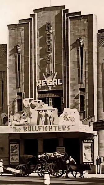 1965 : Regal Cinema Square, Mumbai. Evening., An Evening at Colaba, 1965, The sun dipped low over the Arabian Sea, casting golden hues across the wide expanse of Marine Drive as the bustle of Bombay ...