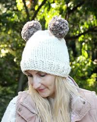 Crochet hat with pom poms