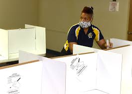 Poll Worker Monique Fugate And Son Ready For Election Day On Tuesday