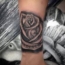 Rose tattoos are very popular nowadays, not only on women but surprisingly also on men. Top 81 Money Rose Tattoo Ideas 2021 Inspiration Guide Money Rose Tattoo Tattoo Designs Men Money Rose