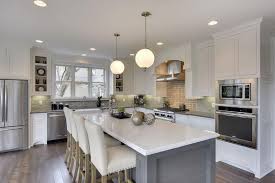 One area where it has become common is in kitchen cabinets. White Kitchen With Gray Island Design Ideas Designing Idea