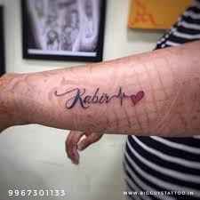 Name With Heart Tattoo Mumbaitattoocolaba Bigguystattoo Tattoo Nametattoo Chesttatt Heart Tattoos With Names Heartbeat Tattoo With Name Initial Tattoo