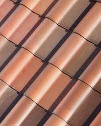 Unlike aftermarket solar panels, they stand in for traditional roofing materials and look like the real thing from the ground. Tesla Solar Roof Terracotta Tuscan Tile Teslarati