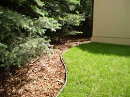 Ecoborder is an ecofriendly landscaping edge made of 100% recycled tires. Lawn Edging Time Saving When You Install It Correctly Laidback Gardener