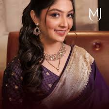 Celebrating Love and Tradition: Malhar Thakkar & Puja Joshi Choose Manubhai  Jewellers for Their Wedding