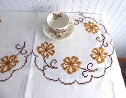 Fabric, thread, needles and instructions. Border Cross Stitch Table Cloth Design
