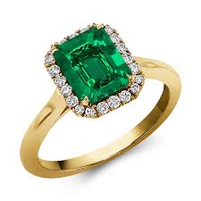 Columbian Trap Cut Emerald Ring 1.63ct in 18ct Yellow Gold - Cluster Ring  with Carre Cut Shoulders | Pragnell