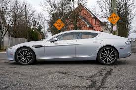 Image result for Lightning Silver 2011 Aston Martin