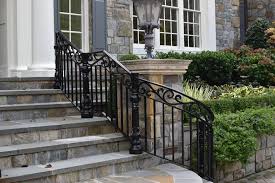 Standard picket iron railings matches the plain picket balcony. Exterior Railings Compass Iron Works