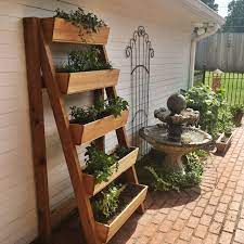 Cedar Vertical Herb Garden In Use Vertical Herb Garden Vertical Herb Gardens Vertical Garden