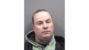 China Grove man arrested for breaking into tow truck carrying his vehicle